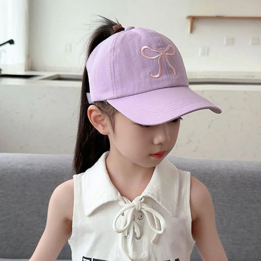 Embroidered Bow Cap: The Secret to a Charming and Practical Look
